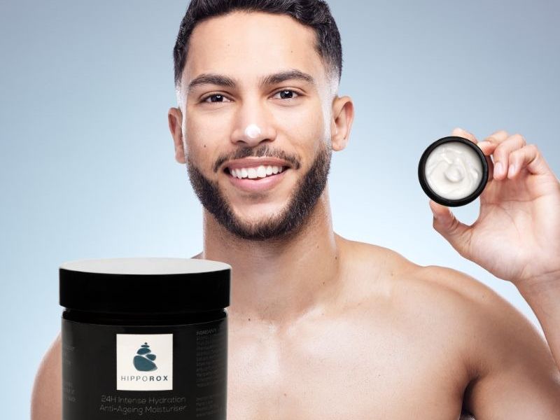 man holding moisturiser
